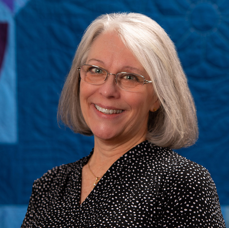 Portrait of quilting instructor Cathy Shea Wright